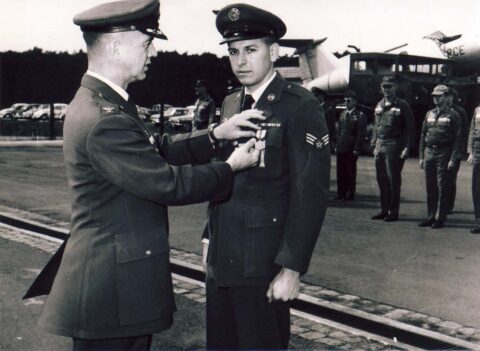 A1C Franklin J. Vinson awarded AF Commendation Medal by Col. Edwards