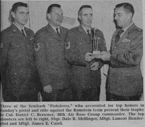 Col. Daniel C. Brawner, 38th Air Base Group Commander of Sembach,presented with trophy from the recent Ramstein shooting.